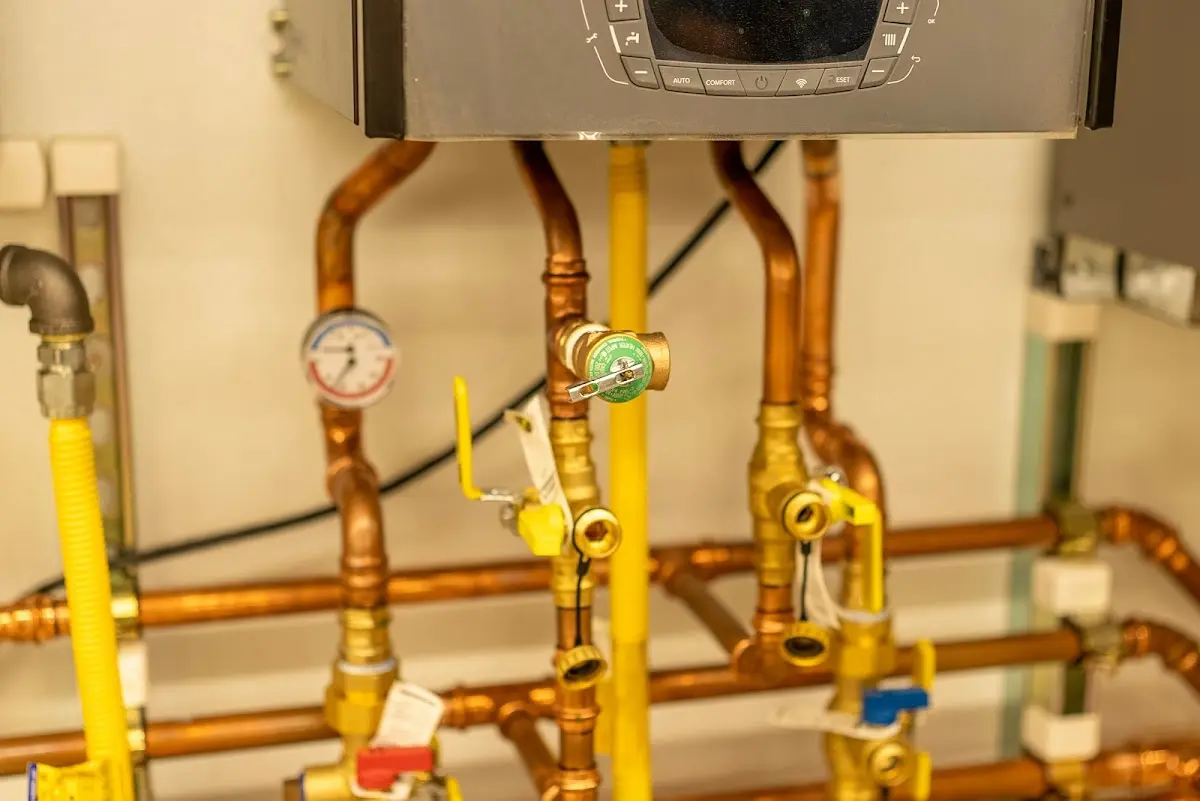 Licensed technician providing Water Heater Installation for a homeowner in Malden